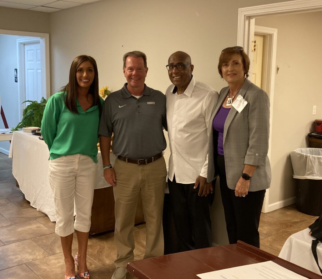 Community Liaison Kacie Long, Sulligent Mayor J. Scott Boman, Dr. Earl Suttle, and Regional Director Denise Shirley pose for a picture at the Sulligent kickoff